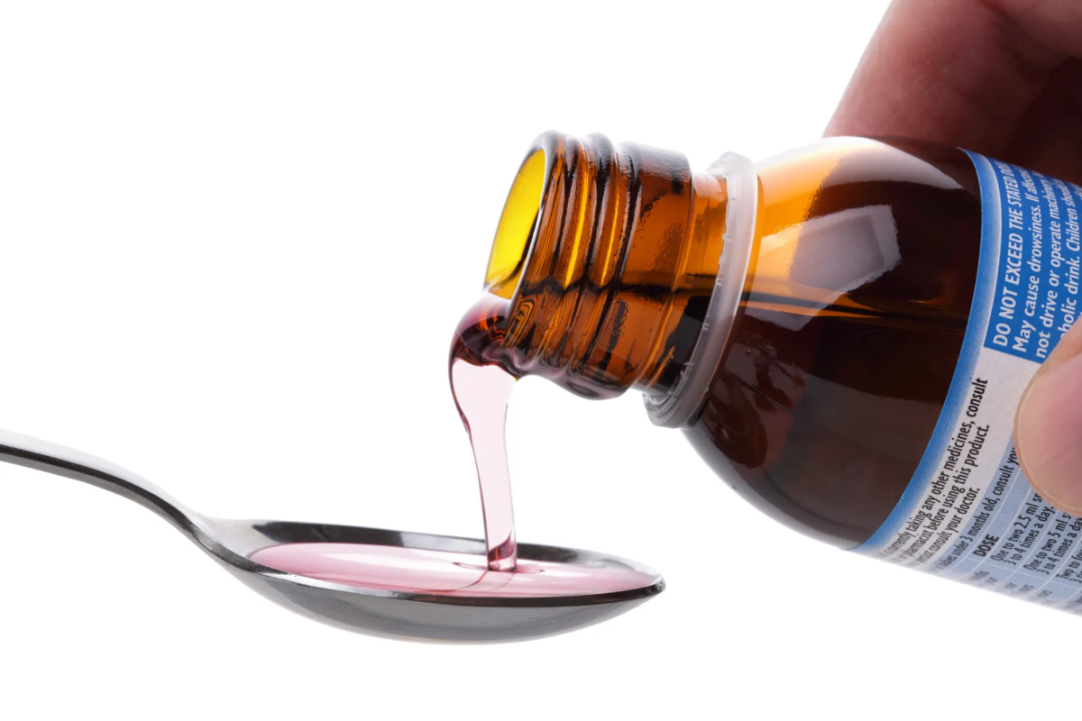 Bottle of cough syrup with codeine for severe dry cough relief