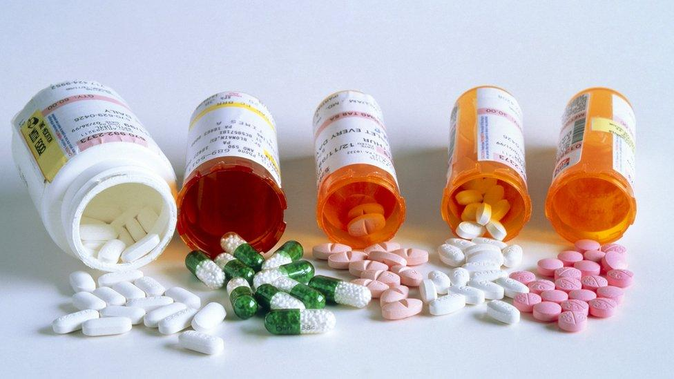 Comprehensive benzodiazepines list showing prescription bottle bottles and medication tablets