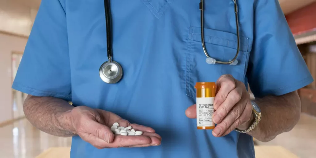Prescription painkillers for back pain provided in secure pharmacy packaging